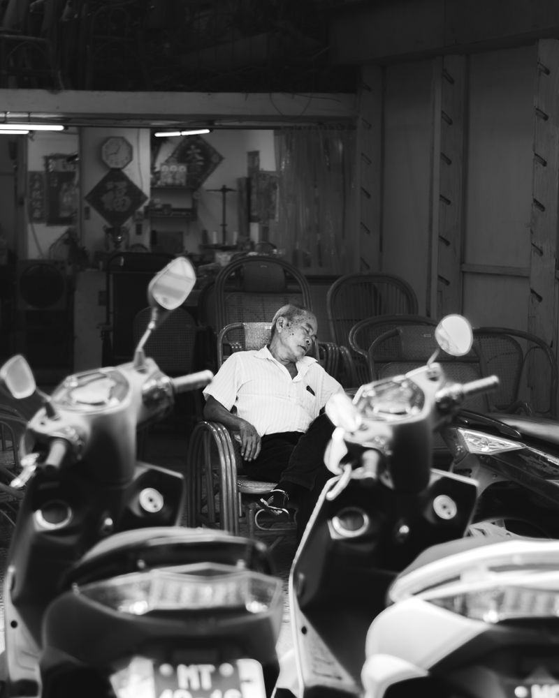 Asleep among the scooters